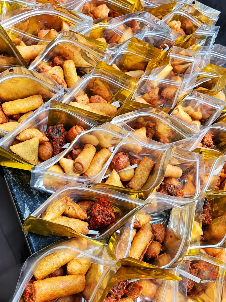Packaged Small Chops Combo – Samosa, Spring Rolls, Puff-Puff & Chicken